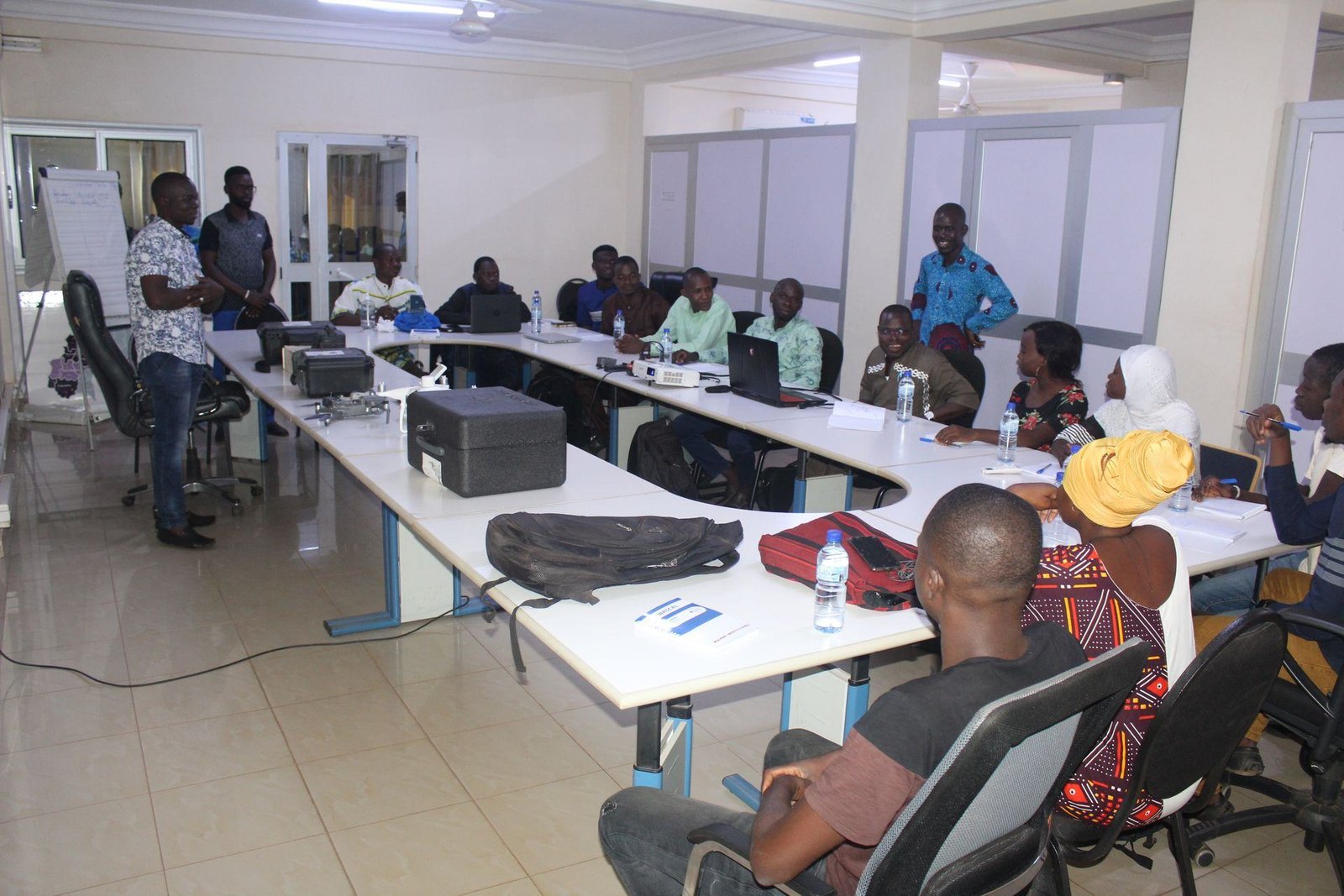 Project training workshop with participants seated around tables